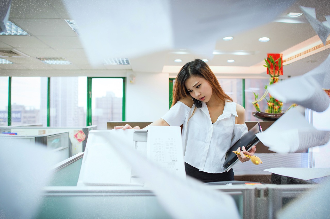 Copier rental with woman and paper flying