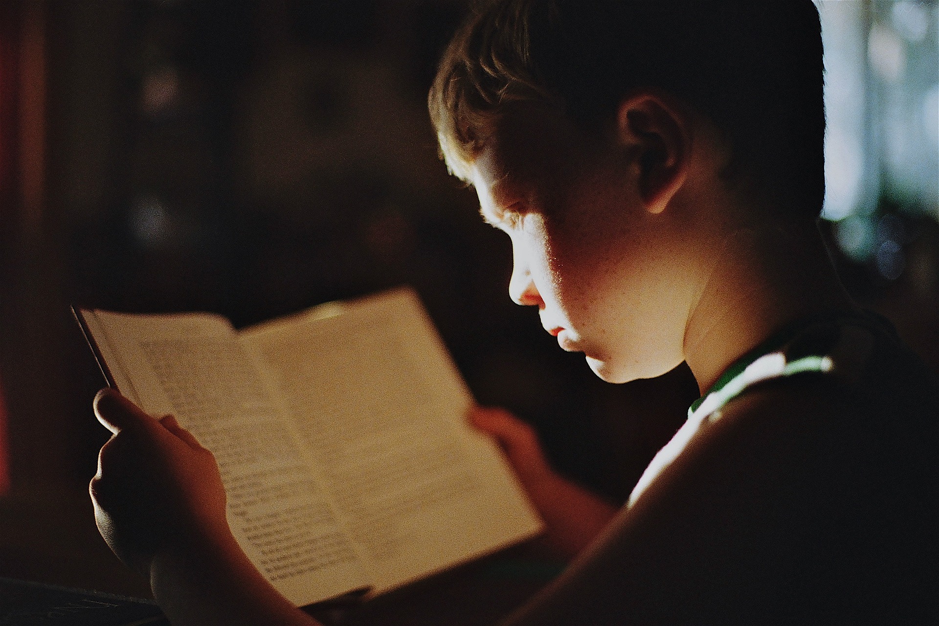 child reading book